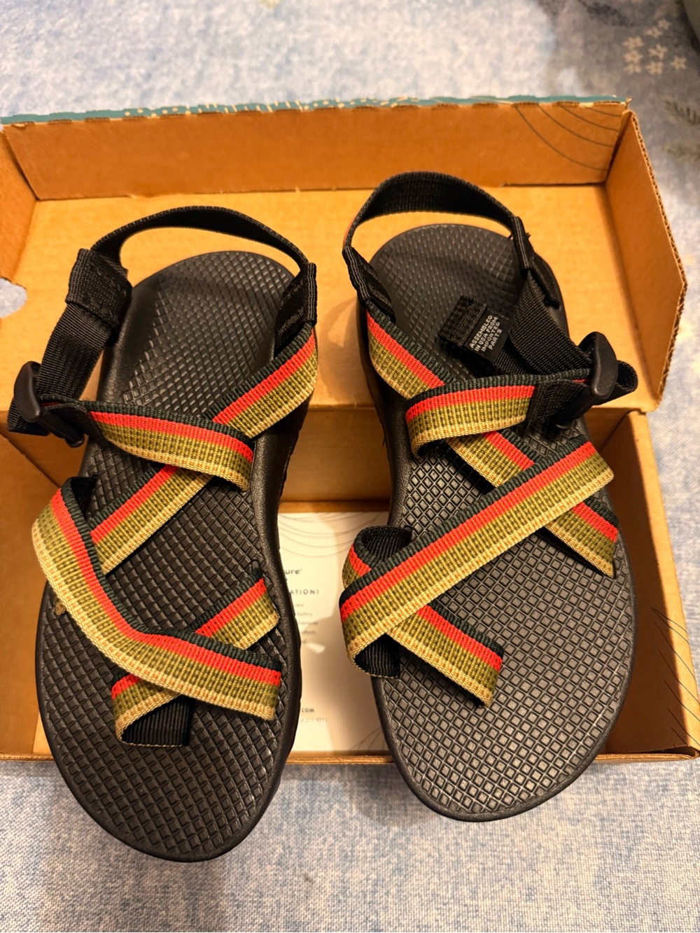 Chaco Black Sandals with Red and Green Striped Webbing